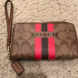 Coach varsity stripe wristlet wallet.